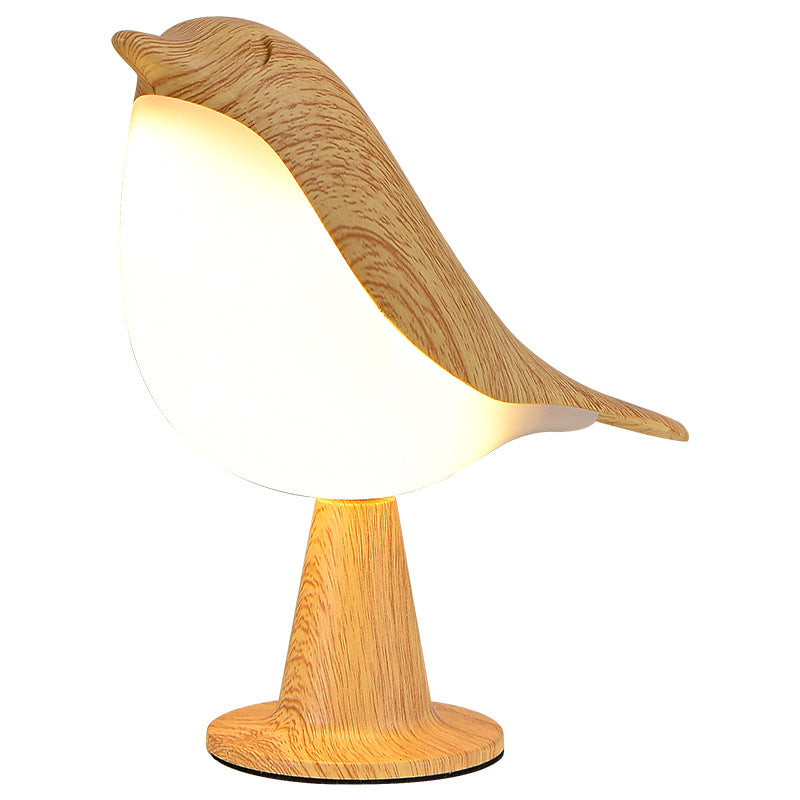 Luminária de mesa com toque, difusor de essências e brilho regulável.