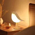 Luminária de mesa com toque, difusor de essências e brilho regulável.