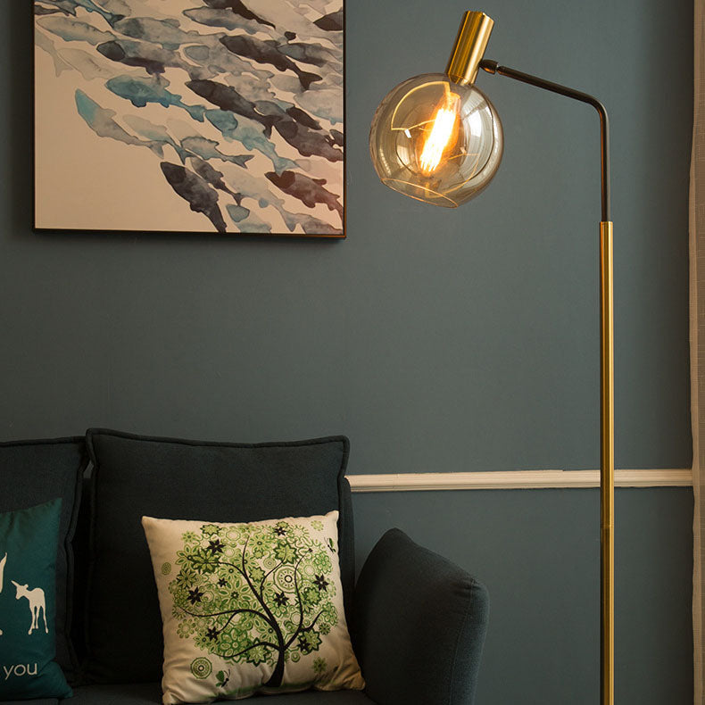 Luminária de mesa em estilo nórdico minimalista com cúpula de vidro e base de mármore para uma luz elegante.