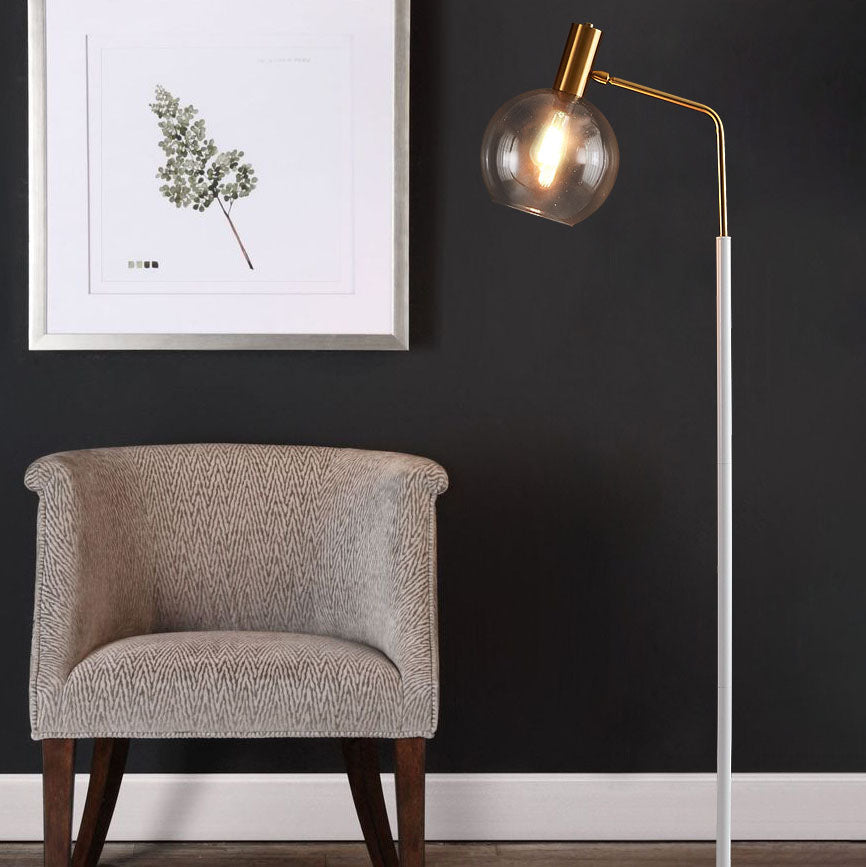 Luminária de mesa em estilo nórdico minimalista com cúpula de vidro e base de mármore para uma luz elegante.