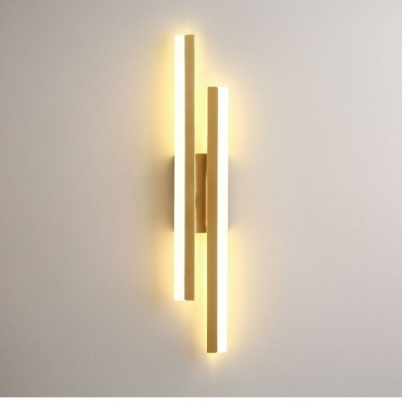 Luminária de parede LED com design minimalista e sofisticado para um toque contemporâneo em seus espaços. Dourado