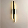 Luminária de parede LED em design minimalista com acabamento elegante para ambientes sofisticados. Preto (esquerda)
