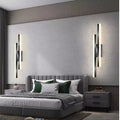 Luminária de parede LED em design minimalista com acabamento elegante para ambientes sofisticados.