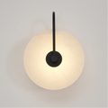 Luminária de parede LED em mármore alabastro com design contemporâneo e toque sofisticado para iluminar com elegância sua decoração moderna. Preto