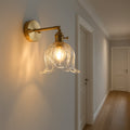 Luminária de parede com iluminação suave e design floral minimalista em vidro cristalino. Transparente