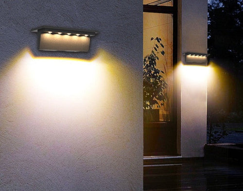 Luminária de parede elegante com iluminação LED ambiente e acabamento resistente em aço inoxidável para exteriores. Luz quente e fria (dimerizável)