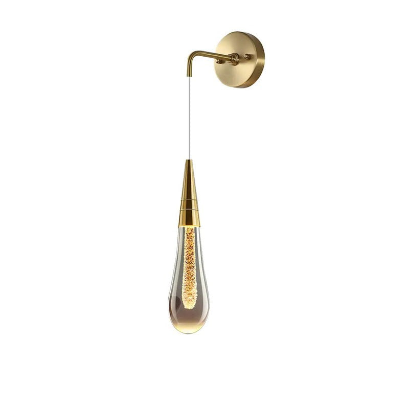 Luminária de parede em LED com design escultural em forma de gota d'água, oferecendo uma iluminação suave e envolvente.