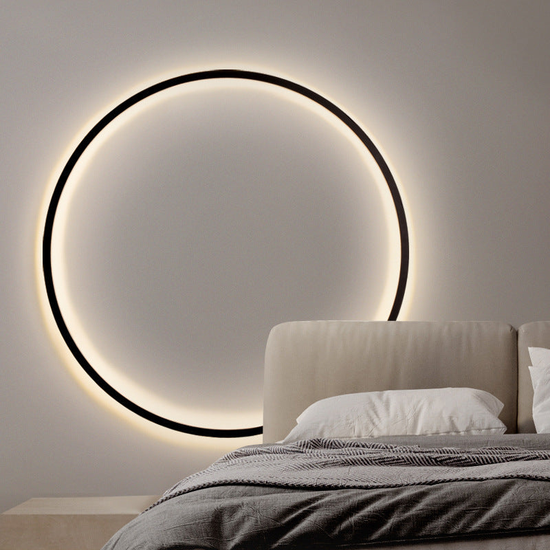 Luminária de parede em anel luxuoso com iluminação suave e design contemporâneo para ambientes requintados.