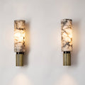 Luminária de parede em pedra cobre com design Sleek, perfeita para iluminar espaços contemporâneos com elegância.