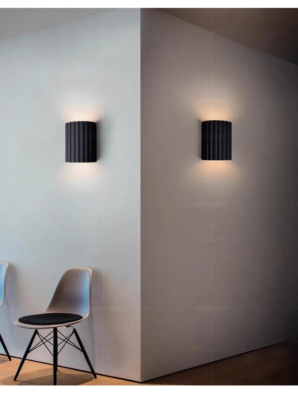 Luminária de parede em resina escultural, com iluminação suave e design contemporâneo, ideal para sofisticação de ambientes.