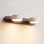 Luminária de parede em travertino refinado, com iluminação suave e design contemporâneo para ambientes sofisticados. 2-Luzes Cor Noz