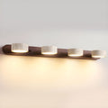 Luminária de parede em travertino refinado, com iluminação suave e design contemporâneo para ambientes sofisticados. 4-Luzes Cor Noz