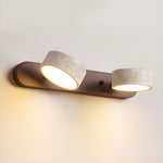 Luminária de parede em travertino refinado, com iluminação suave e design contemporâneo para ambientes sofisticados.