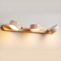 Luminária de parede em travertino refinado, com iluminação suave e design contemporâneo para ambientes sofisticados.
