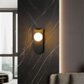 Luminária de parede escultural escandinava com iluminação suave e design minimalista refinado.