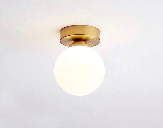 Luminária de parede minimalista em estilo escandinavo com iluminação suave e difusa para ambientes sofisticados.