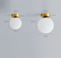 Luminária de parede minimalista em estilo escandinavo com iluminação suave e difusa para ambientes sofisticados.