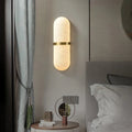 Luminária de parede sofisticada com design escandinavo em mármore e luz suave. Dourado