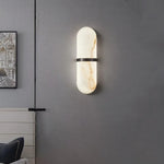 Luminária de parede sofisticada com design escandinavo em mármore e luz suave. Preto