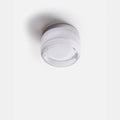 Luminária de parede sofisticada com iluminação suave e relevo artístico contemporâneo.
