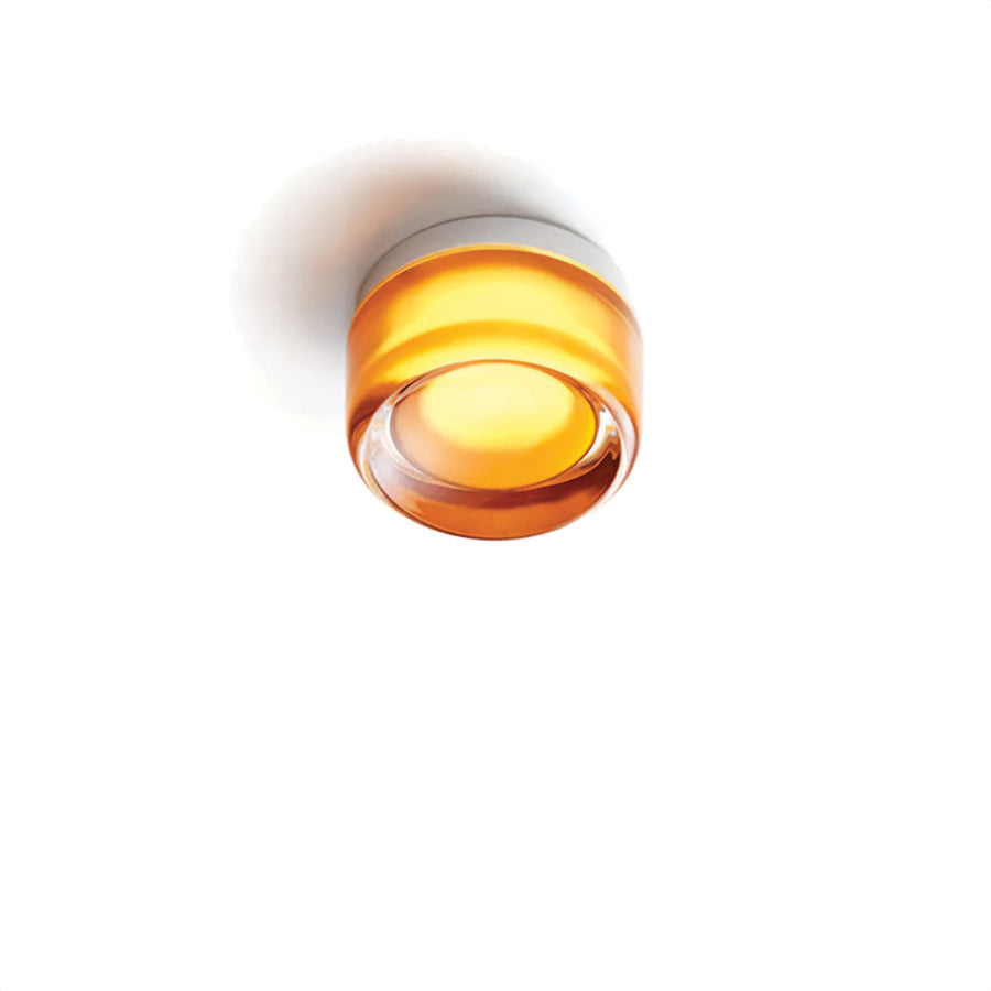 Luminária de parede sofisticada com iluminação suave e relevo artístico contemporâneo.
