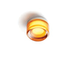 Luminária de parede sofisticada com iluminação suave e relevo artístico contemporâneo.