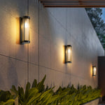 Luminária externa cilíndrica de metal e vidro, resistente à água IP65 com design moderno. 38cm