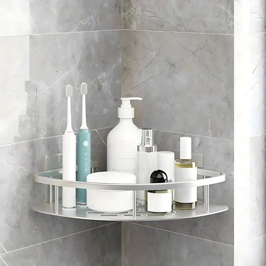 Prateleira Curvada para Chuveiro – Solução Elegante e Funcional de Organização Prata