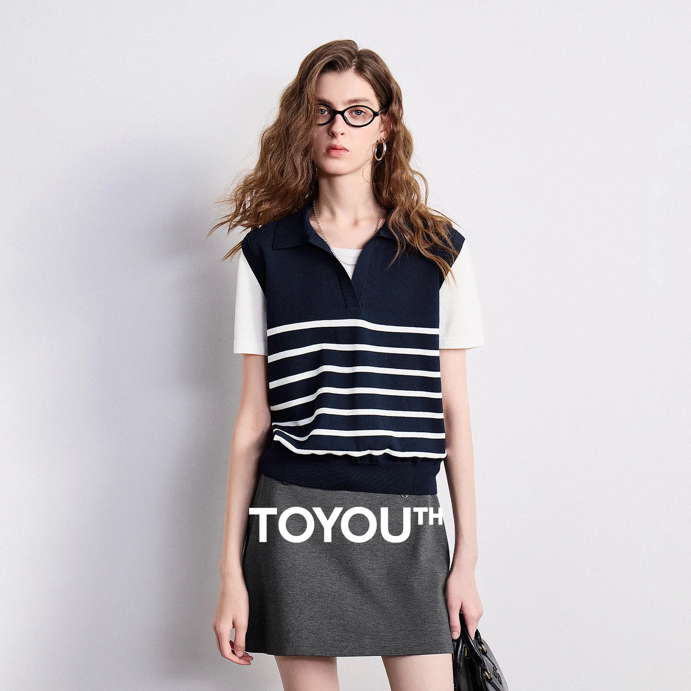 Blusa Feminina de Tricô Listrada com Gola Polo