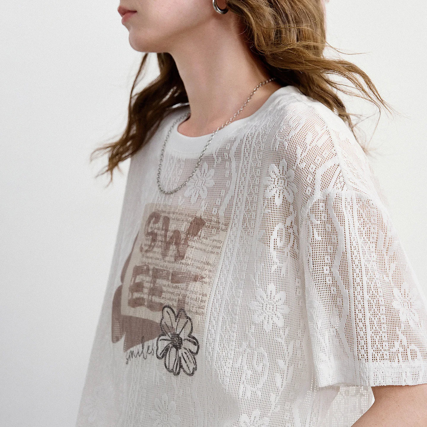 Blusa Feminina de Renda Transparente com Estampa Floral
