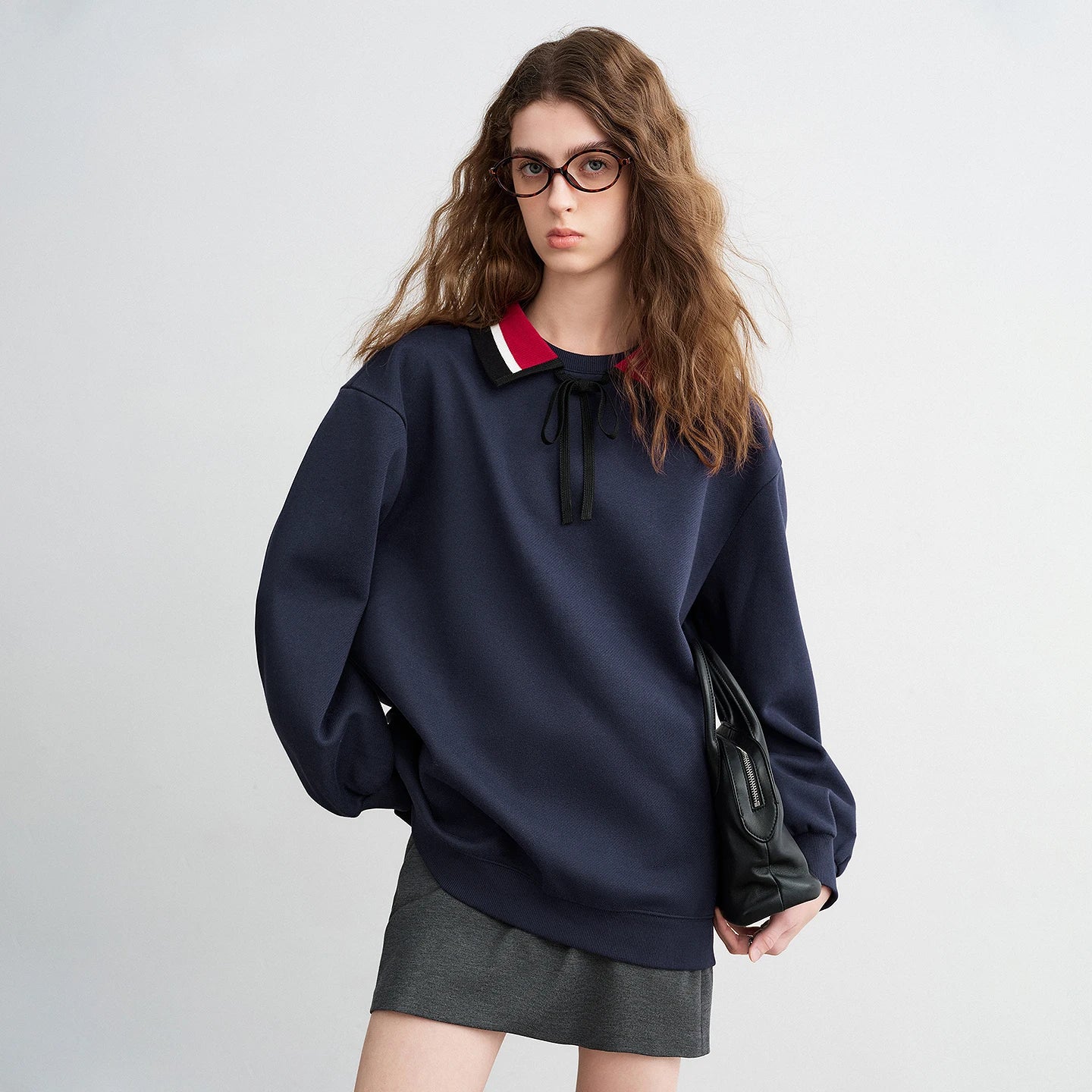 Moletom Feminino Listrado com Gola Polo e Caimento Solto