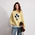 Moletom Feminino de Tricô Listrado com Gola Polo