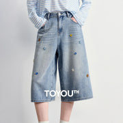 Calça Jeans Feminina Wide Leg Cropped com Botões Coloridos
