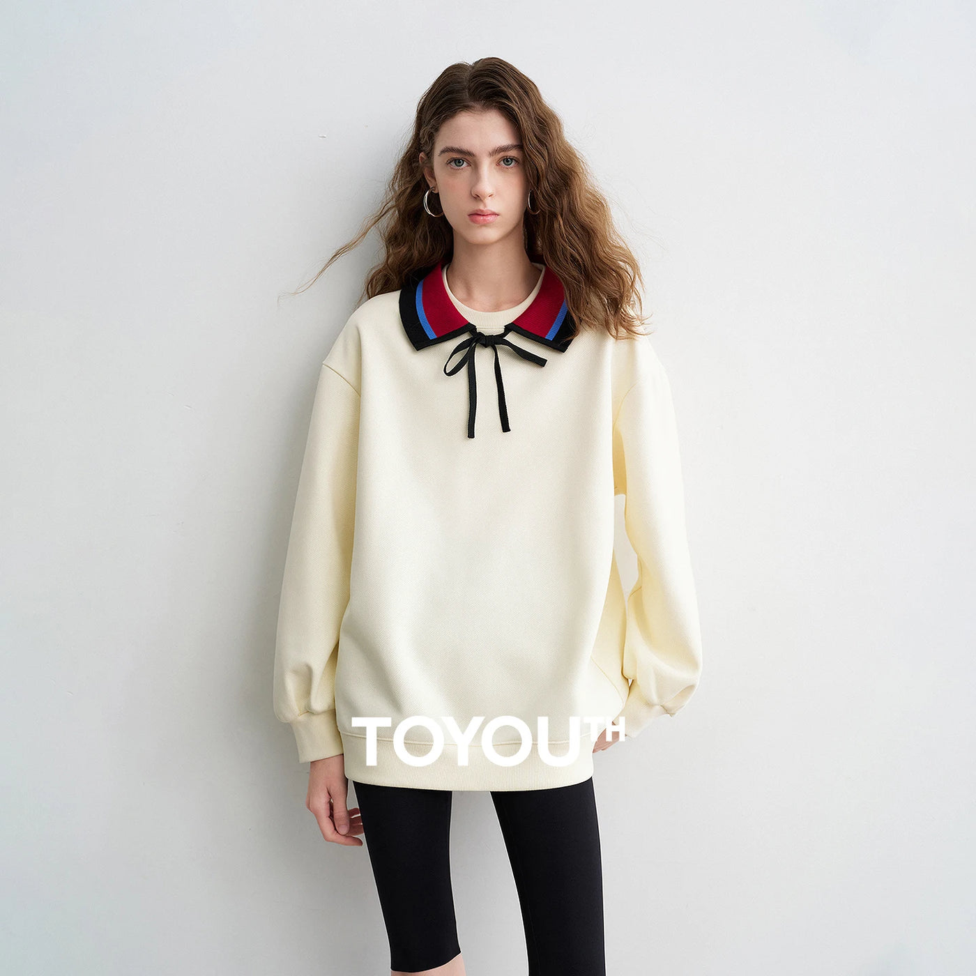 Moletom Feminino Listrado com Gola Polo e Caimento Solto
