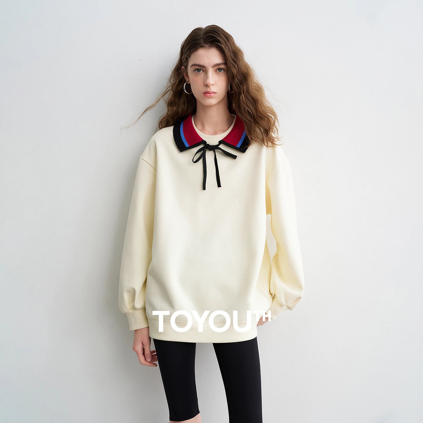 Moletom Feminino Listrado com Gola Polo e Caimento Solto