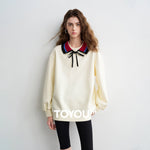 Moletom Feminino Listrado com Gola Polo e Caimento Solto