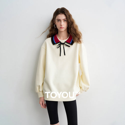 Moletom Feminino Listrado com Gola Polo e Caimento Solto