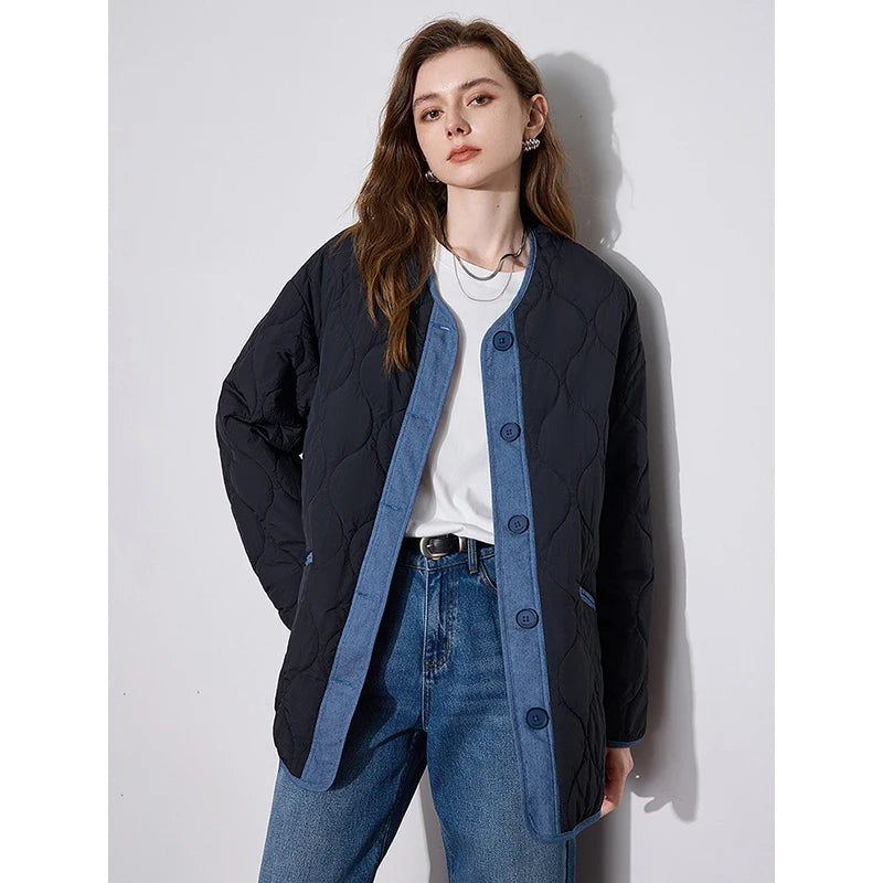 Jaqueta Feminina com Recortes Jeans e Gola Redonda